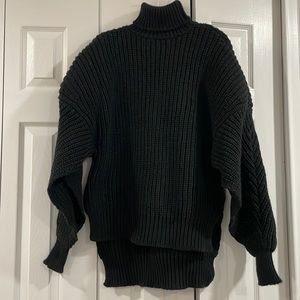 Oversized cutout wool turtleneck